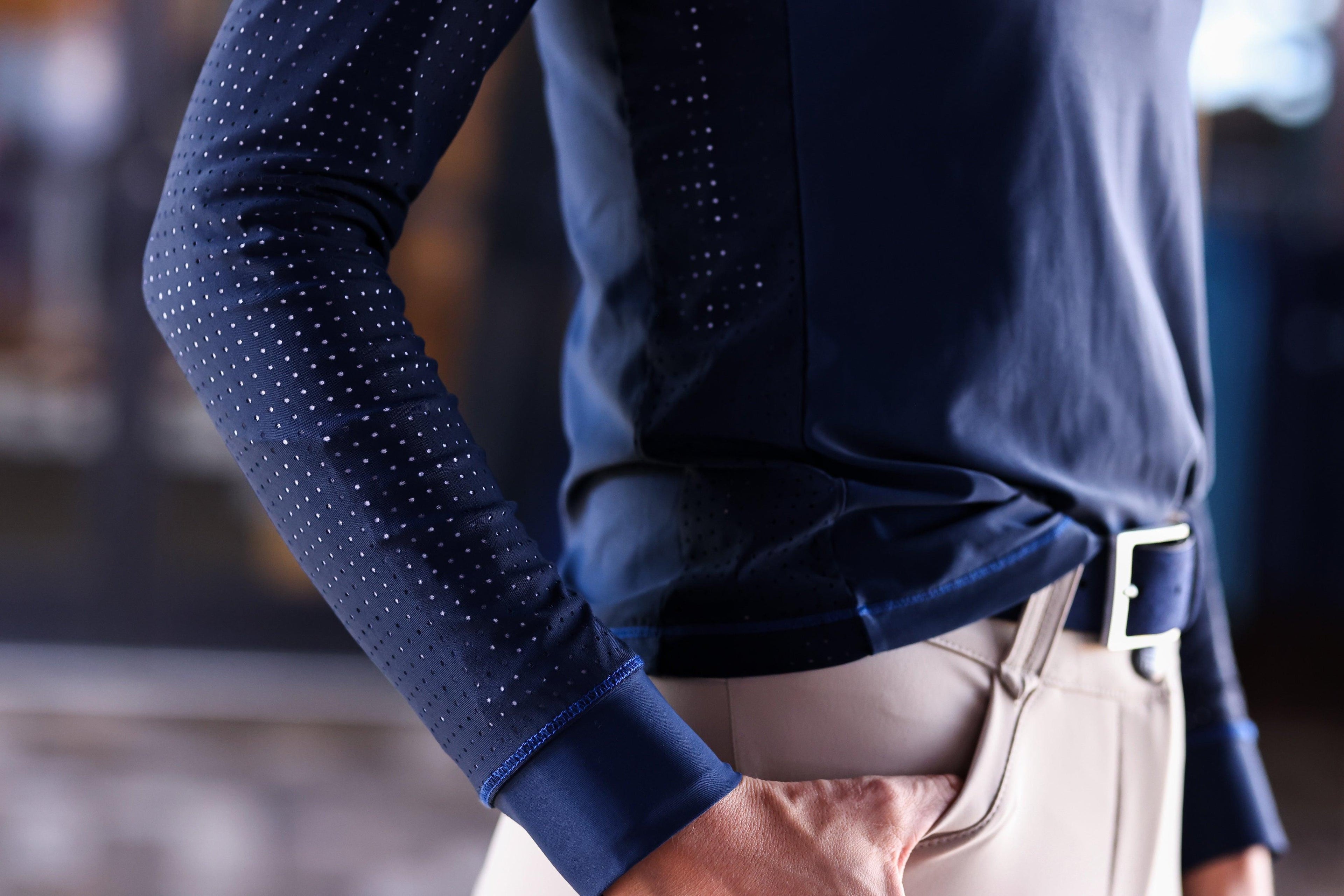 Technical perforated hoodie designed for equestrian enthusiasts, combining style and functionality seamlessly.