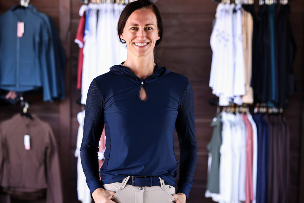 Technical perforated hoodie designed for equestrian enthusiasts, combining style and functionality seamlessly.