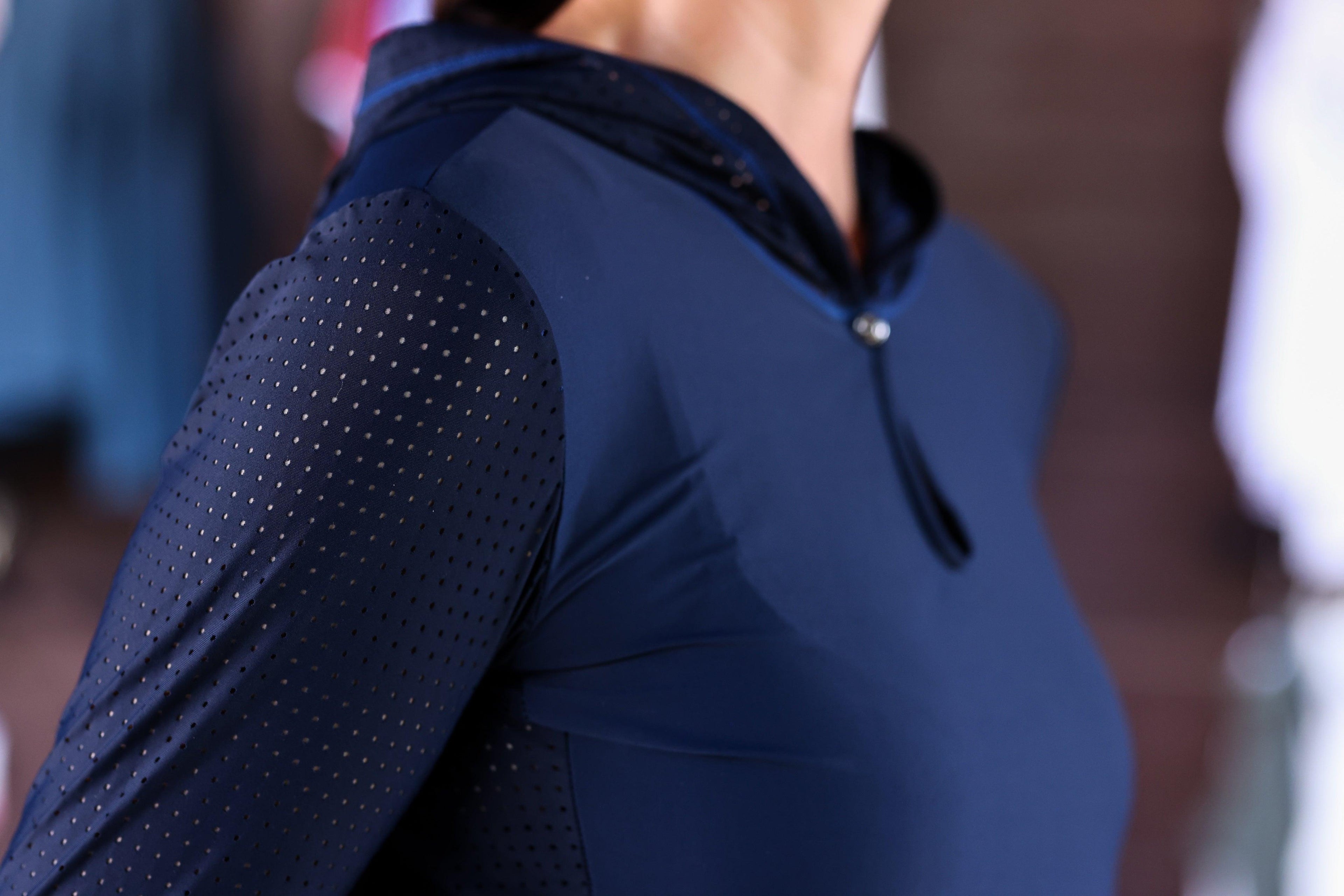 Technical perforated hoodie designed for equestrian enthusiasts, combining style and functionality seamlessly.