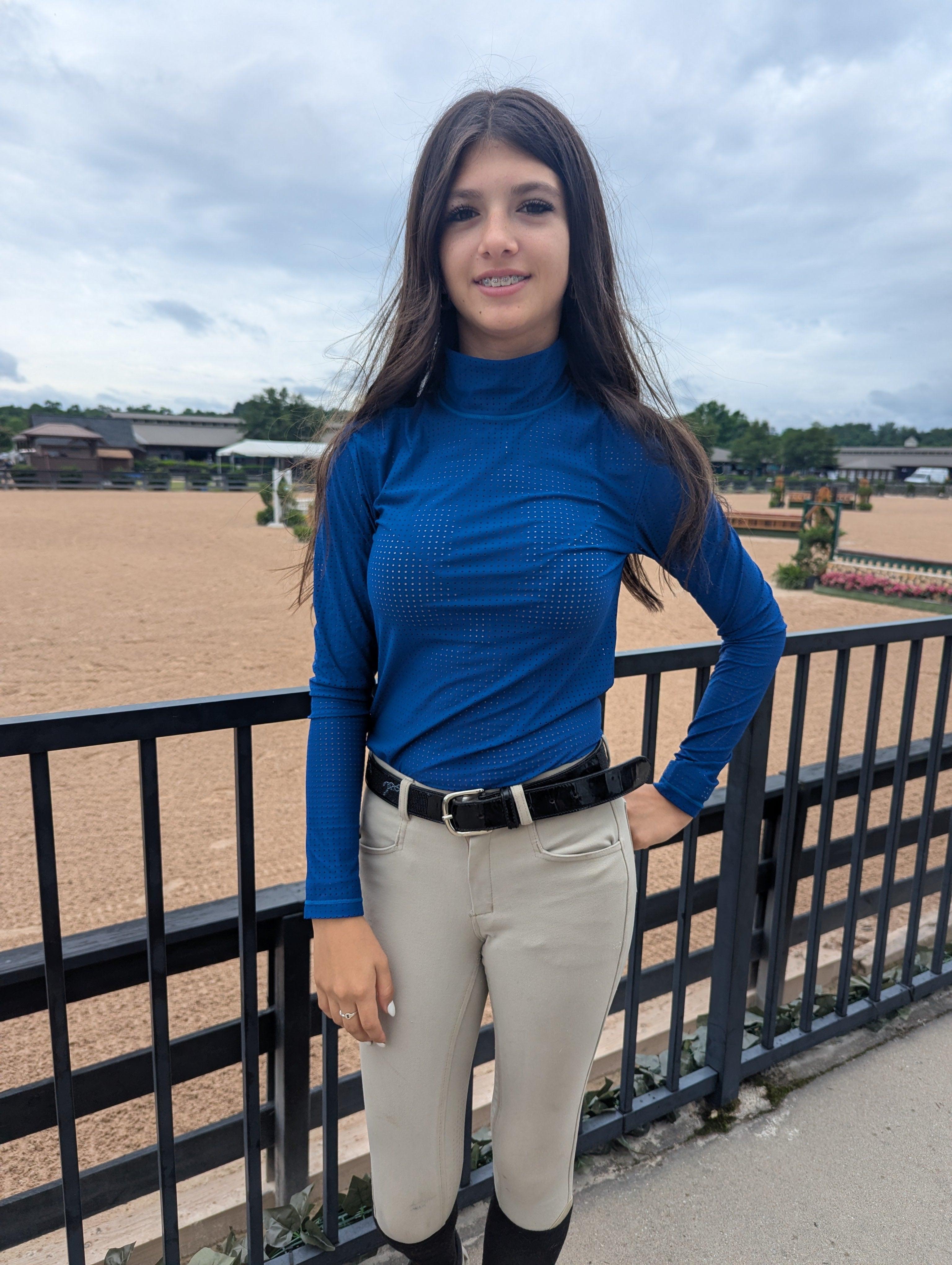 A turtleneck designed for equestrian performance and style